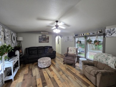TIRED OF SKY-HIGH RENT? SAY HELLO TO YOUR AFFORDABLE ESCAPE! on Lakes of the North Deer Run Golf Course in Michigan - for sale on GolfHomes.com, golf home, golf lot