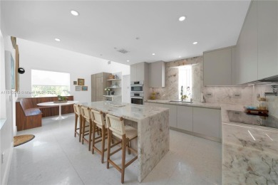 Casa Delfin is a move-in ready dream home, currently configured on Deering Bay Yacht and Country Club in Florida - for sale on GolfHomes.com, golf home, golf lot