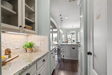 Welcome to your dream home on the green! Perfectly positioned on on Trophy Club of Dallas in Texas - for sale on GolfHomes.com, golf home, golf lot