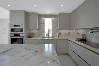 Casa Delfin is a move-in ready dream home, currently configured on Deering Bay Yacht and Country Club in Florida - for sale on GolfHomes.com, golf home, golf lot