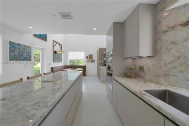 Casa Delfin is a move-in ready dream home, currently configured on Deering Bay Yacht and Country Club in Florida - for sale on GolfHomes.com, golf home, golf lot