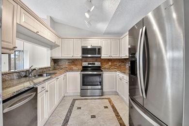 Charming 3 bedroom 2 bath villa on a quiet cul-de-sac. Stunning on  in Florida - for sale on GolfHomes.com, golf home, golf lot