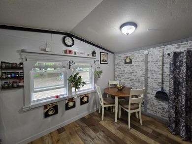 TIRED OF SKY-HIGH RENT? SAY HELLO TO YOUR AFFORDABLE ESCAPE! on Lakes of the North Deer Run Golf Course in Michigan - for sale on GolfHomes.com, golf home, golf lot