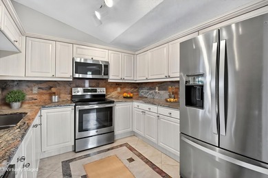 Charming 3 bedroom 2 bath villa on a quiet cul-de-sac. Stunning on  in Florida - for sale on GolfHomes.com, golf home, golf lot