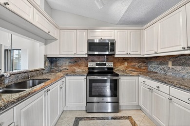 Charming 3 bedroom 2 bath villa on a quiet cul-de-sac. Stunning on  in Florida - for sale on GolfHomes.com, golf home, golf lot