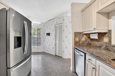 Charming 3 bedroom 2 bath villa on a quiet cul-de-sac. Stunning on  in Florida - for sale on GolfHomes.com, golf home, golf lot