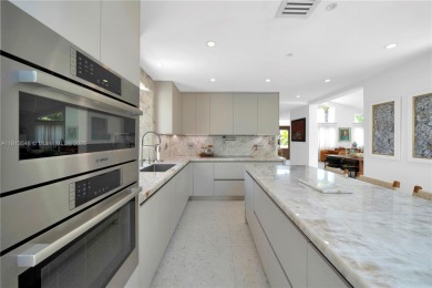 Casa Delfin is a move-in ready dream home, currently configured on Deering Bay Yacht and Country Club in Florida - for sale on GolfHomes.com, golf home, golf lot