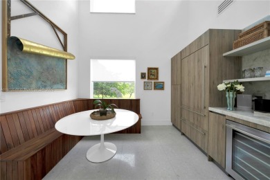 Casa Delfin is a move-in ready dream home, currently configured on Deering Bay Yacht and Country Club in Florida - for sale on GolfHomes.com, golf home, golf lot