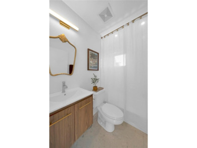 Casa Delfin is a move-in ready dream home, currently configured on Deering Bay Yacht and Country Club in Florida - for sale on GolfHomes.com, golf home, golf lot