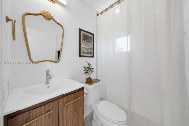 Casa Delfin is a move-in ready dream home, currently configured on Deering Bay Yacht and Country Club in Florida - for sale on GolfHomes.com, golf home, golf lot