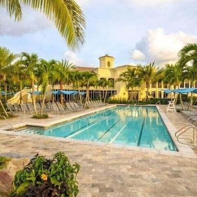 Light & open, this lovely 2-story home of 3 bedrooms & 2 1/2 on Woodfield Country Club in Florida - for sale on GolfHomes.com, golf home, golf lot