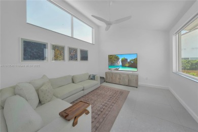 Casa Delfin is a move-in ready dream home, currently configured on Deering Bay Yacht and Country Club in Florida - for sale on GolfHomes.com, golf home, golf lot