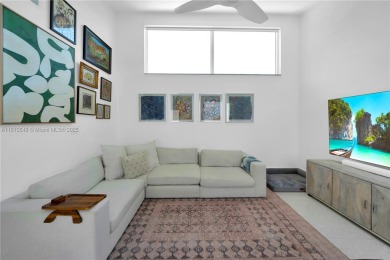 Casa Delfin is a move-in ready dream home, currently configured on Deering Bay Yacht and Country Club in Florida - for sale on GolfHomes.com, golf home, golf lot
