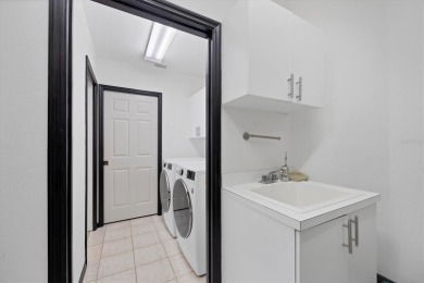 Welcome to this exquisite residence, perfectly nestled on a on University Park Country Club in Florida - for sale on GolfHomes.com, golf home, golf lot