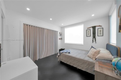 Casa Delfin is a move-in ready dream home, currently configured on Deering Bay Yacht and Country Club in Florida - for sale on GolfHomes.com, golf home, golf lot