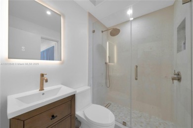 Casa Delfin is a move-in ready dream home, currently configured on Deering Bay Yacht and Country Club in Florida - for sale on GolfHomes.com, golf home, golf lot