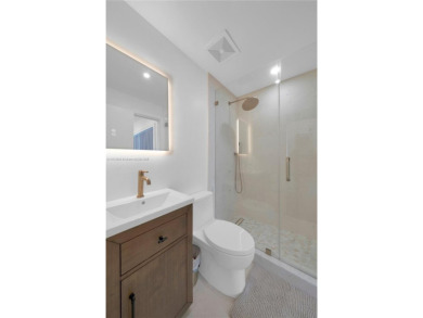Casa Delfin is a move-in ready dream home, currently configured on Deering Bay Yacht and Country Club in Florida - for sale on GolfHomes.com, golf home, golf lot