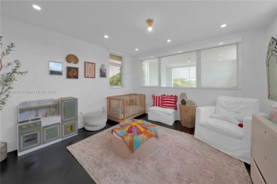 Casa Delfin is a move-in ready dream home, currently configured on Deering Bay Yacht and Country Club in Florida - for sale on GolfHomes.com, golf home, golf lot