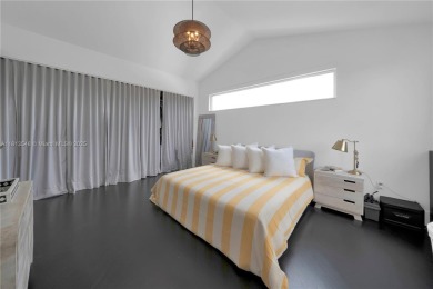 Casa Delfin is a move-in ready dream home, currently configured on Deering Bay Yacht and Country Club in Florida - for sale on GolfHomes.com, golf home, golf lot