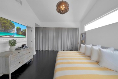 Casa Delfin is a move-in ready dream home, currently configured on Deering Bay Yacht and Country Club in Florida - for sale on GolfHomes.com, golf home, golf lot