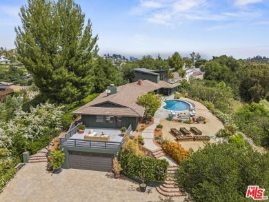 Perched above the Woodland Hills Country Club, this classic 1953 on Woodland Hills Country Club in California - for sale on GolfHomes.com, golf home, golf lot