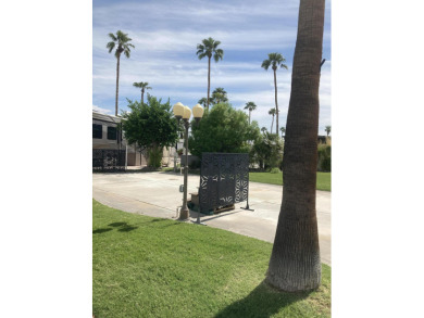 Discover the allure of corner lot 1143, featuring glimpse views on Outdoor Resorts/Palm Springs in California - for sale on GolfHomes.com, golf home, golf lot