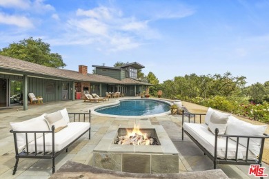 Perched above the Woodland Hills Country Club, this classic 1953 on Woodland Hills Country Club in California - for sale on GolfHomes.com, golf home, golf lot