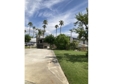 Discover the allure of corner lot 1143, featuring glimpse views on Outdoor Resorts/Palm Springs in California - for sale on GolfHomes.com, golf home, golf lot