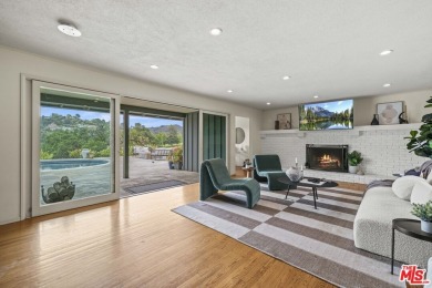 Perched above the Woodland Hills Country Club, this classic 1953 on Woodland Hills Country Club in California - for sale on GolfHomes.com, golf home, golf lot