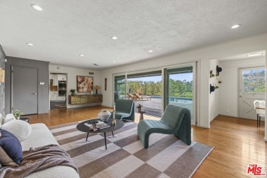 Perched above the Woodland Hills Country Club, this classic 1953 on Woodland Hills Country Club in California - for sale on GolfHomes.com, golf home, golf lot