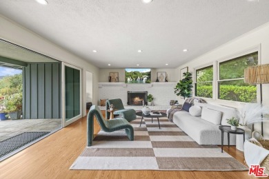 Perched above the Woodland Hills Country Club, this classic 1953 on Woodland Hills Country Club in California - for sale on GolfHomes.com, golf home, golf lot