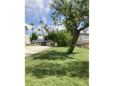 Discover the allure of corner lot 1143, featuring glimpse views on Outdoor Resorts/Palm Springs in California - for sale on GolfHomes.com, golf home, golf lot