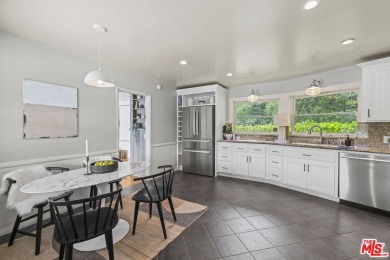 Perched above the Woodland Hills Country Club, this classic 1953 on Woodland Hills Country Club in California - for sale on GolfHomes.com, golf home, golf lot