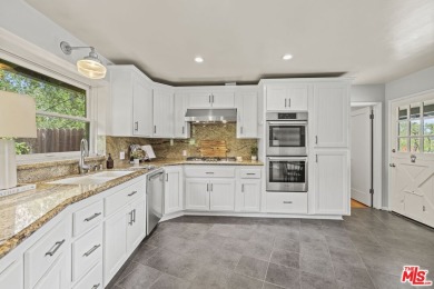 Perched above the Woodland Hills Country Club, this classic 1953 on Woodland Hills Country Club in California - for sale on GolfHomes.com, golf home, golf lot