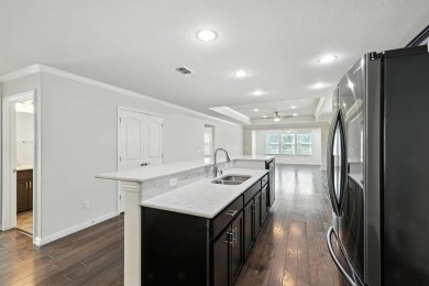 This sought after Steel Creek Model located in Frisco Lakes 55+ on Frisco Lakes Golf Course in Texas - for sale on GolfHomes.com, golf home, golf lot