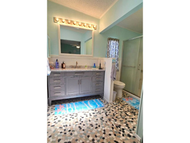 Furnished Golf Course Home in Elite 55+ Riverside Golf and on The Riverside Golf Club in Florida - for sale on GolfHomes.com, golf home, golf lot