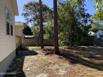 This 3 bedroom 2 bath home in Boiling Spring Lakes provides both on The Lakes Country Club in North Carolina - for sale on GolfHomes.com, golf home, golf lot