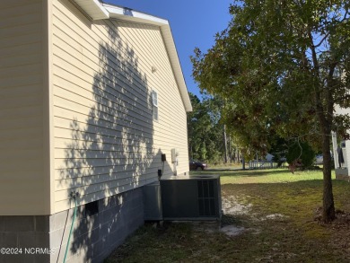 This 3 bedroom 2 bath home in Boiling Spring Lakes provides both on The Lakes Country Club in North Carolina - for sale on GolfHomes.com, golf home, golf lot