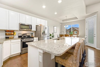 Low-maintenance living near the Poudre River Trail! Set in the on Boomerang Links in Colorado - for sale on GolfHomes.com, golf home, golf lot