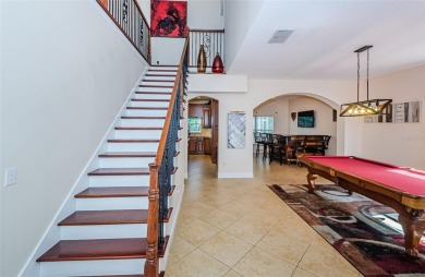 One or more photo(s) has been virtually staged. Nestled within on The Eagles Golf Course and Club in Florida - for sale on GolfHomes.com, golf home, golf lot