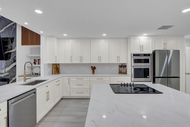 39 Edinburgh Drive on PGA National Golf Club in Florida - for sale on GolfHomes.com, golf home, golf lot