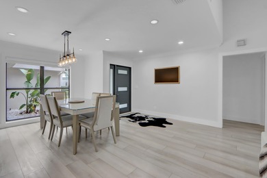 39 Edinburgh Drive on PGA National Golf Club in Florida - for sale on GolfHomes.com, golf home, golf lot