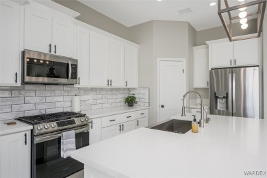 This contemporary home is located in the beautiful and gated Los on Los Lagos Golf Club in Arizona - for sale on GolfHomes.com, golf home, golf lot