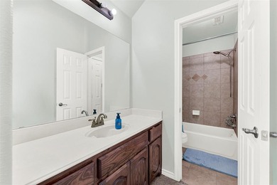 Tucked inside a gated, resort-style community, this home offers on The Golf Club at Resort Eagle Mountain Lake in Texas - for sale on GolfHomes.com, golf home, golf lot