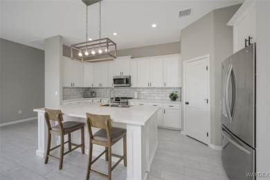 This contemporary home is located in the beautiful and gated Los on Los Lagos Golf Club in Arizona - for sale on GolfHomes.com, golf home, golf lot