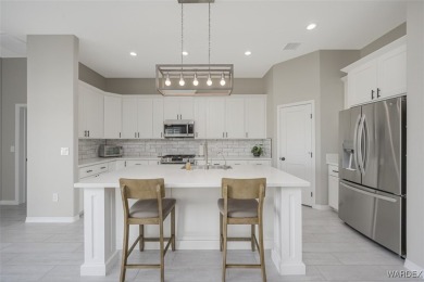 This contemporary home is located in the beautiful and gated Los on Los Lagos Golf Club in Arizona - for sale on GolfHomes.com, golf home, golf lot