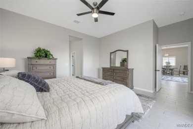 This contemporary home is located in the beautiful and gated Los on Los Lagos Golf Club in Arizona - for sale on GolfHomes.com, golf home, golf lot