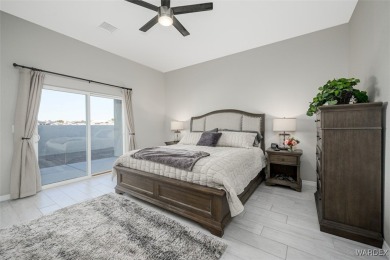 This contemporary home is located in the beautiful and gated Los on Los Lagos Golf Club in Arizona - for sale on GolfHomes.com, golf home, golf lot