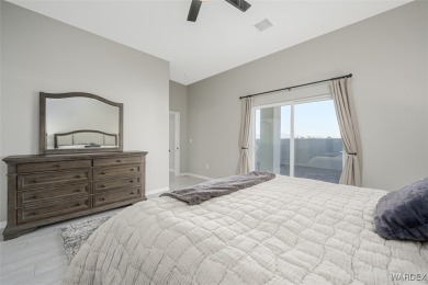 This contemporary home is located in the beautiful and gated Los on Los Lagos Golf Club in Arizona - for sale on GolfHomes.com, golf home, golf lot
