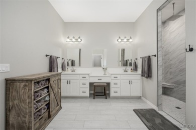 This contemporary home is located in the beautiful and gated Los on Los Lagos Golf Club in Arizona - for sale on GolfHomes.com, golf home, golf lot